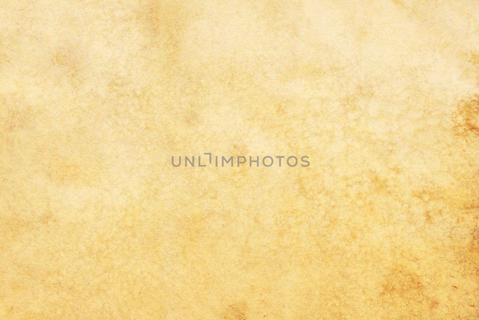 Old brown yellow paper grunge background. Abstract liquid coffee color texture.