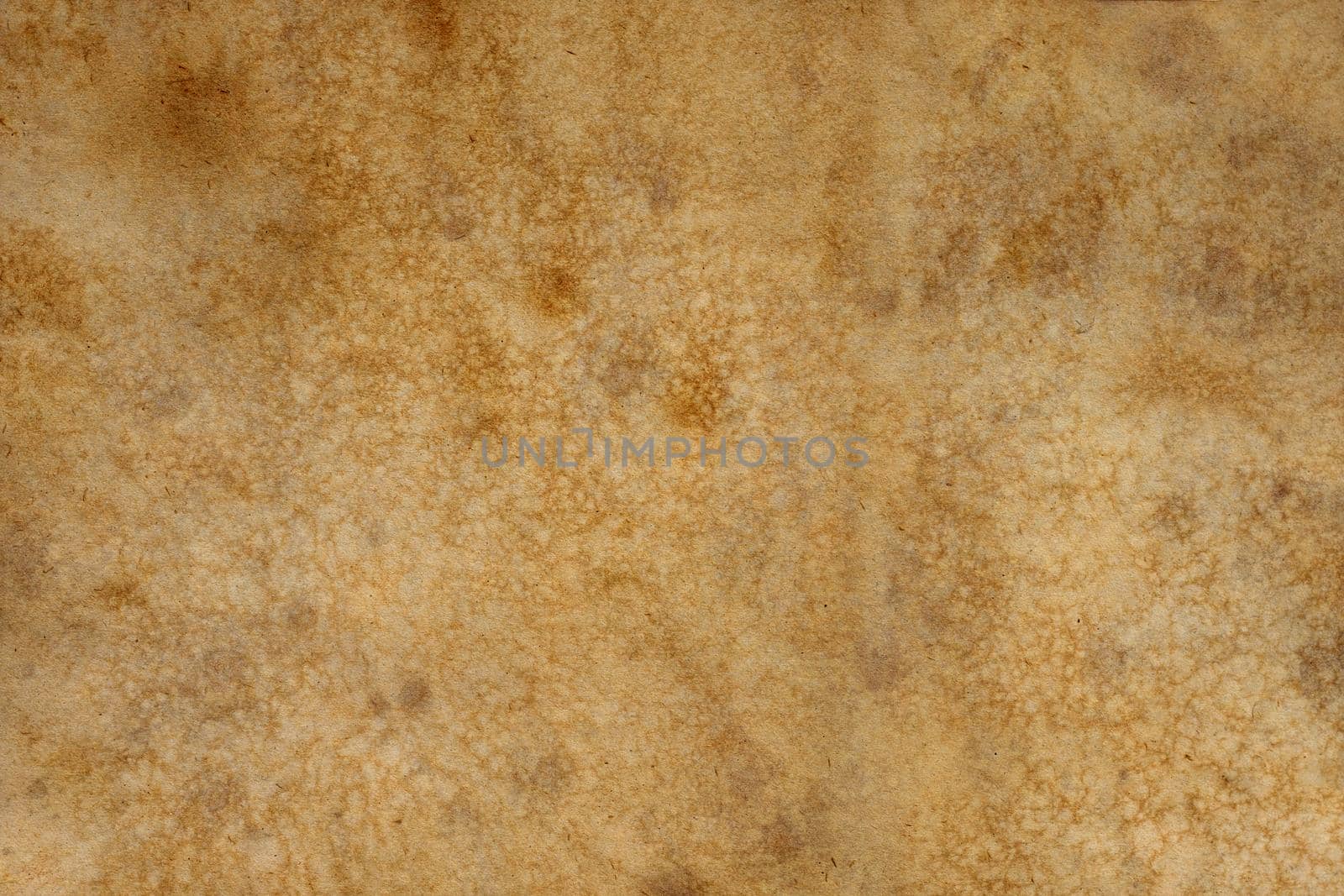 Old brown paper grunge background. Abstract liquid coffee color texture.