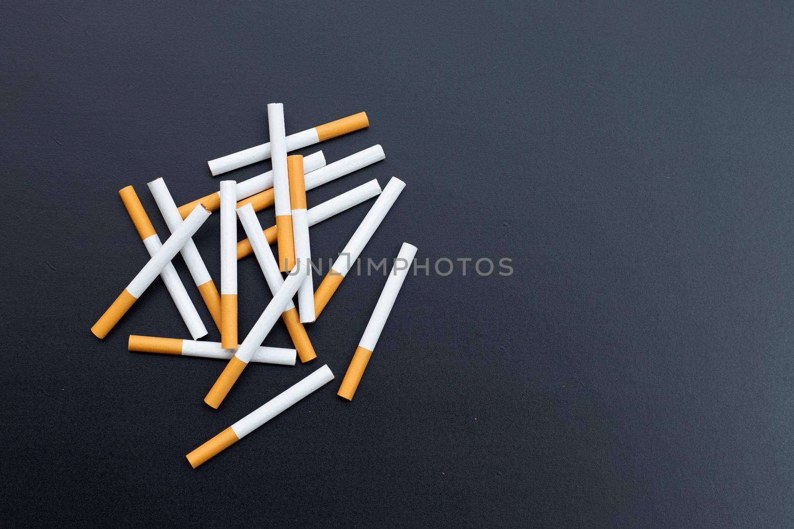 Cigarette on dark background. Non smoking for health concept