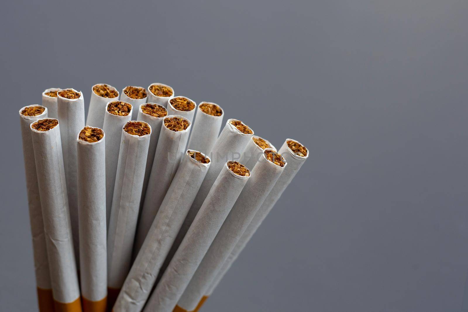 Cigarette on dark background. Non smoking for health concept