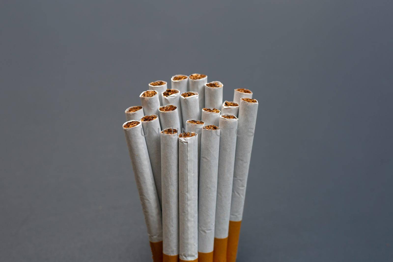 Cigarette on dark background. Non smoking for health concept