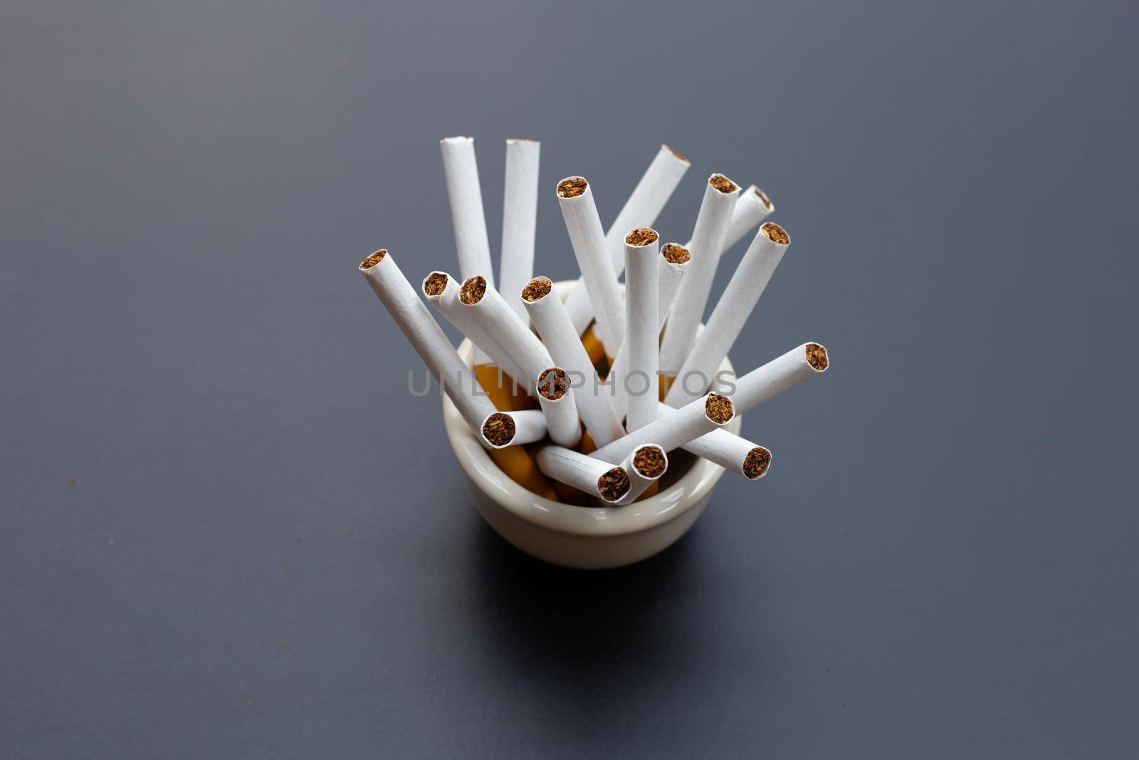 Cigarette on dark background. Non smoking for health concept