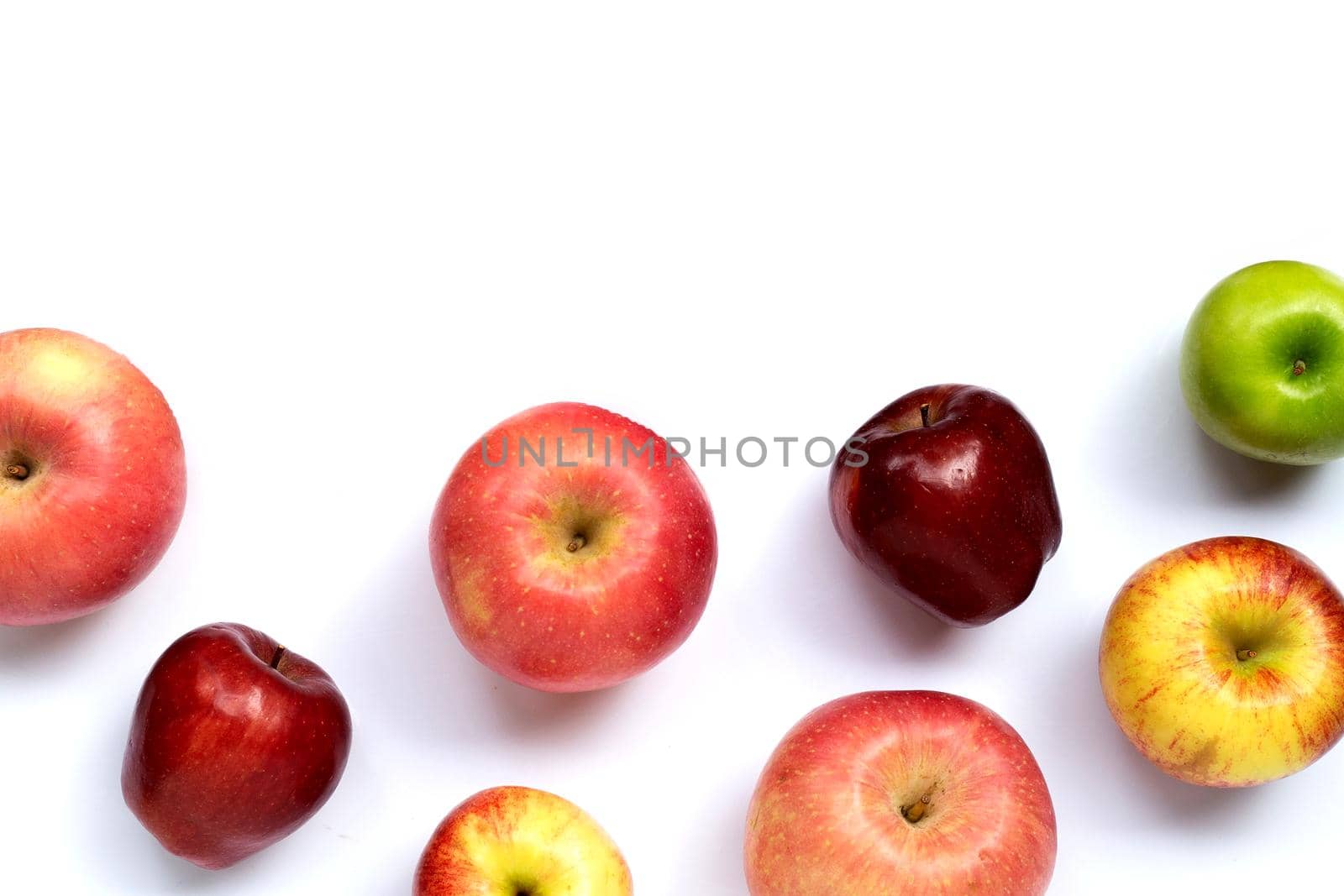 Fresh juicy apples on white background. Copy space