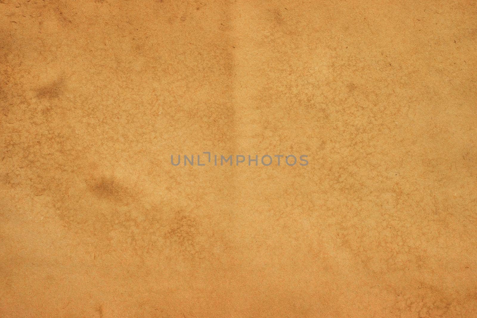 Old brown paper grunge background. Abstract liquid coffee color texture.