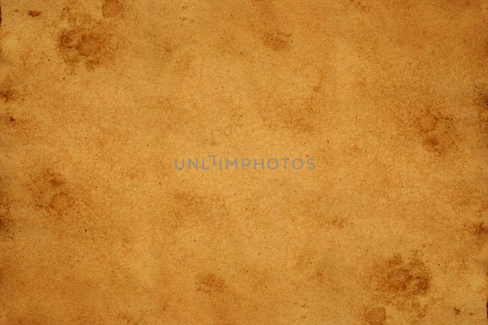 Old brown paper grunge background. Abstract liquid coffee color texture.