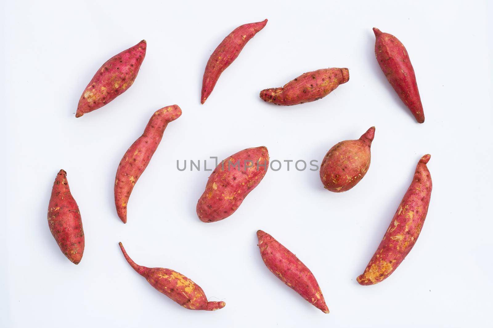 Sweet potato on white background. Top view