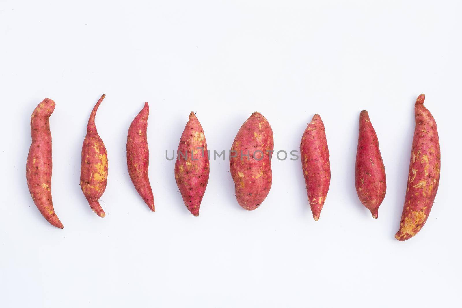 Sweet potato on white background. Top view