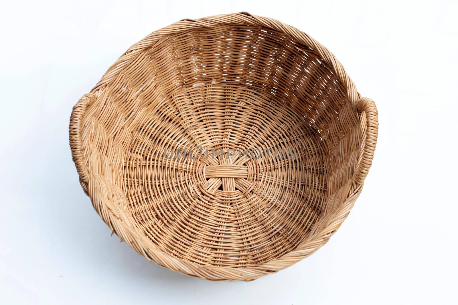 Wicker basket on white background. 