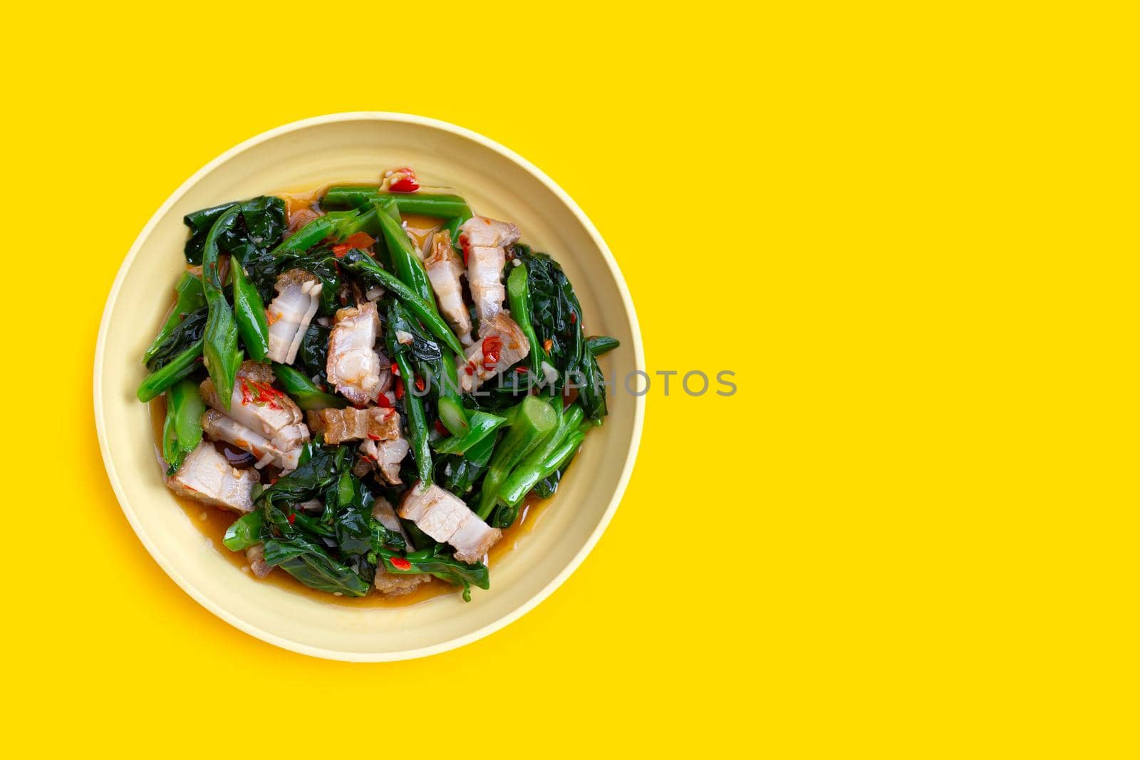 Stir fried chinese kale with crispy pork belly