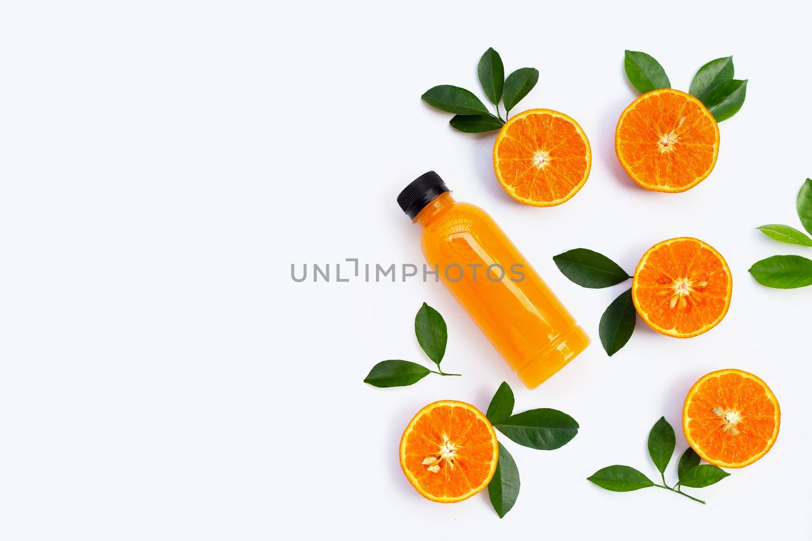 High vitamin C, Juicy and sweet. Fresh orange fruit with bottle of orange juice on white background. Copy space