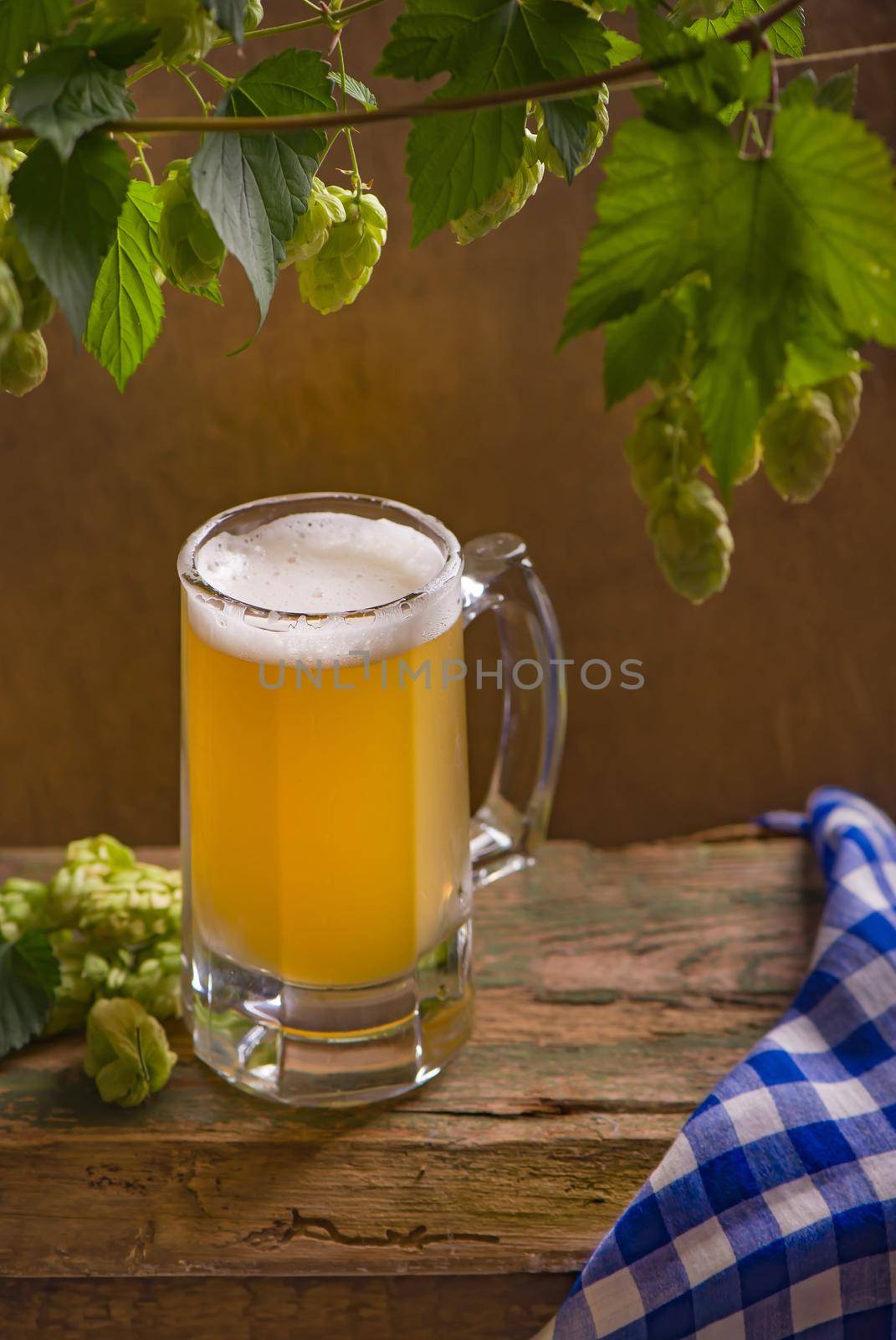 Bavarian Oktoberfest beer and pretzels on wooden table by aprilphoto