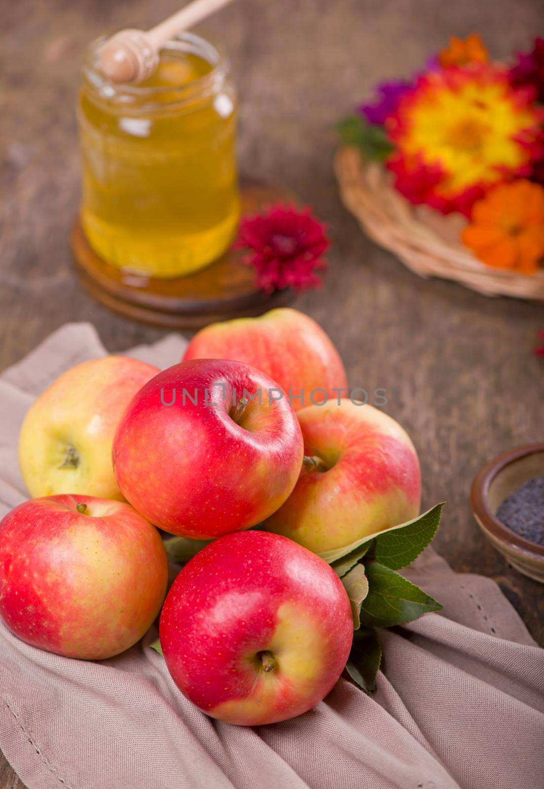 Apple and honey, traditional food of jewish New Year celebration, Rosh Hashana. Selective focus. Copyspace background by aprilphoto