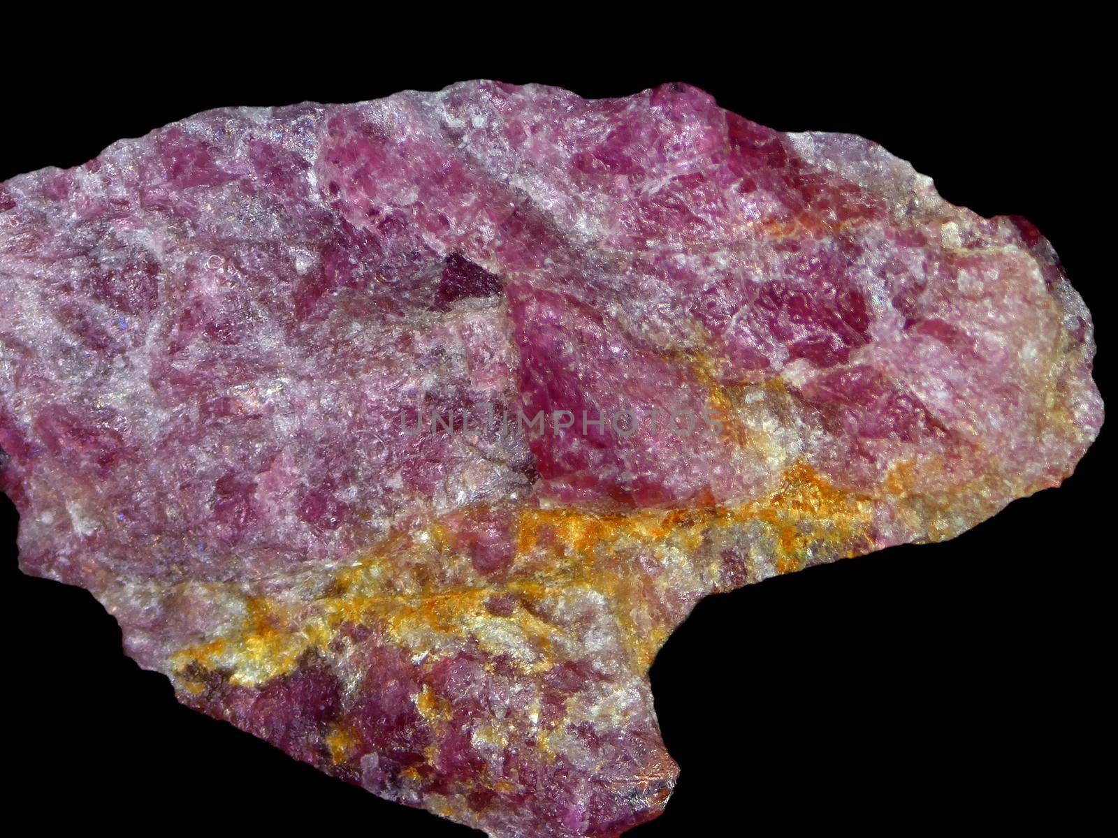 Rubellite, red tourmaline, cut out on a black background