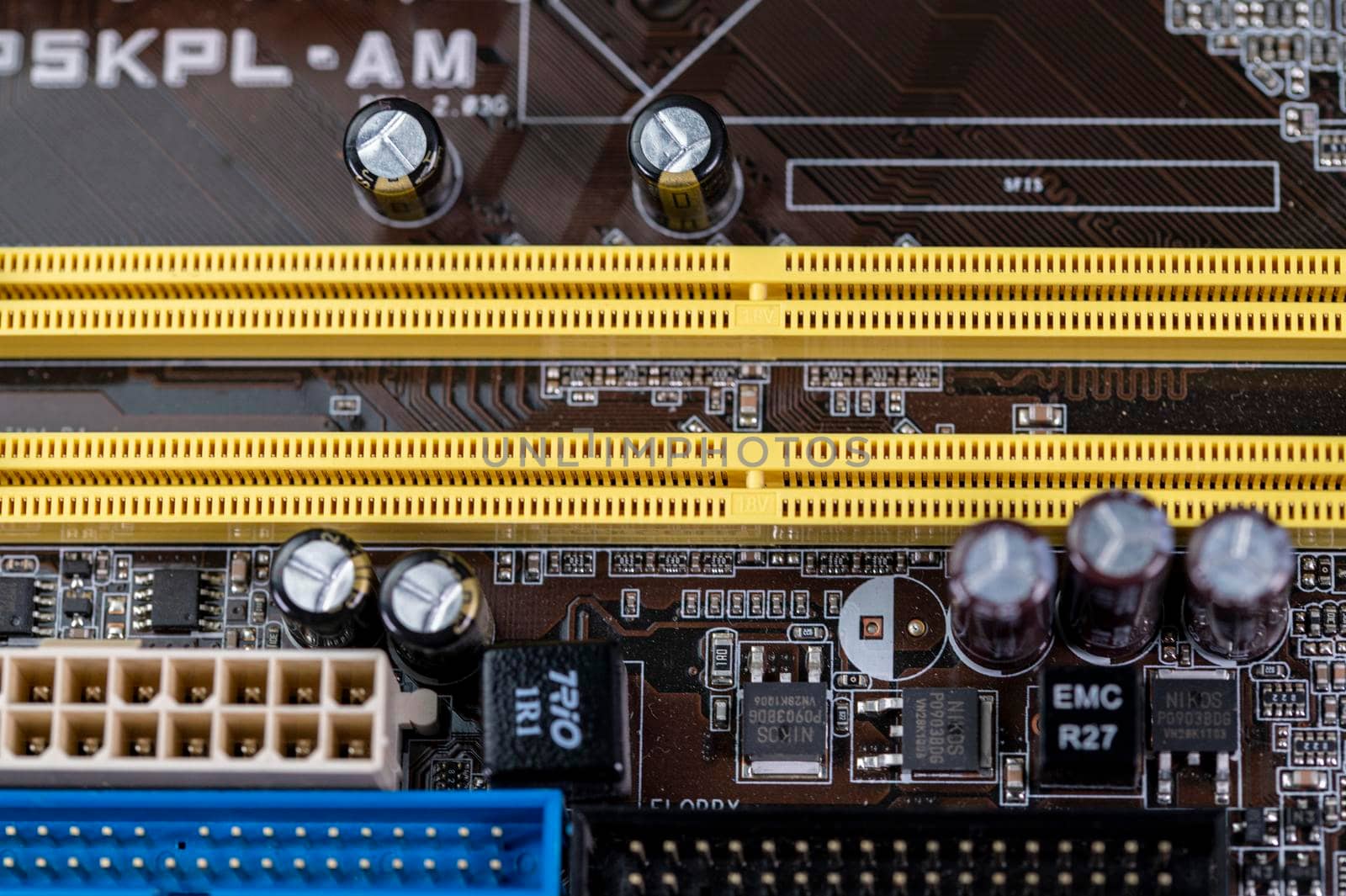 detail of a motherboard with connectors and heatsinks of a fixed computer