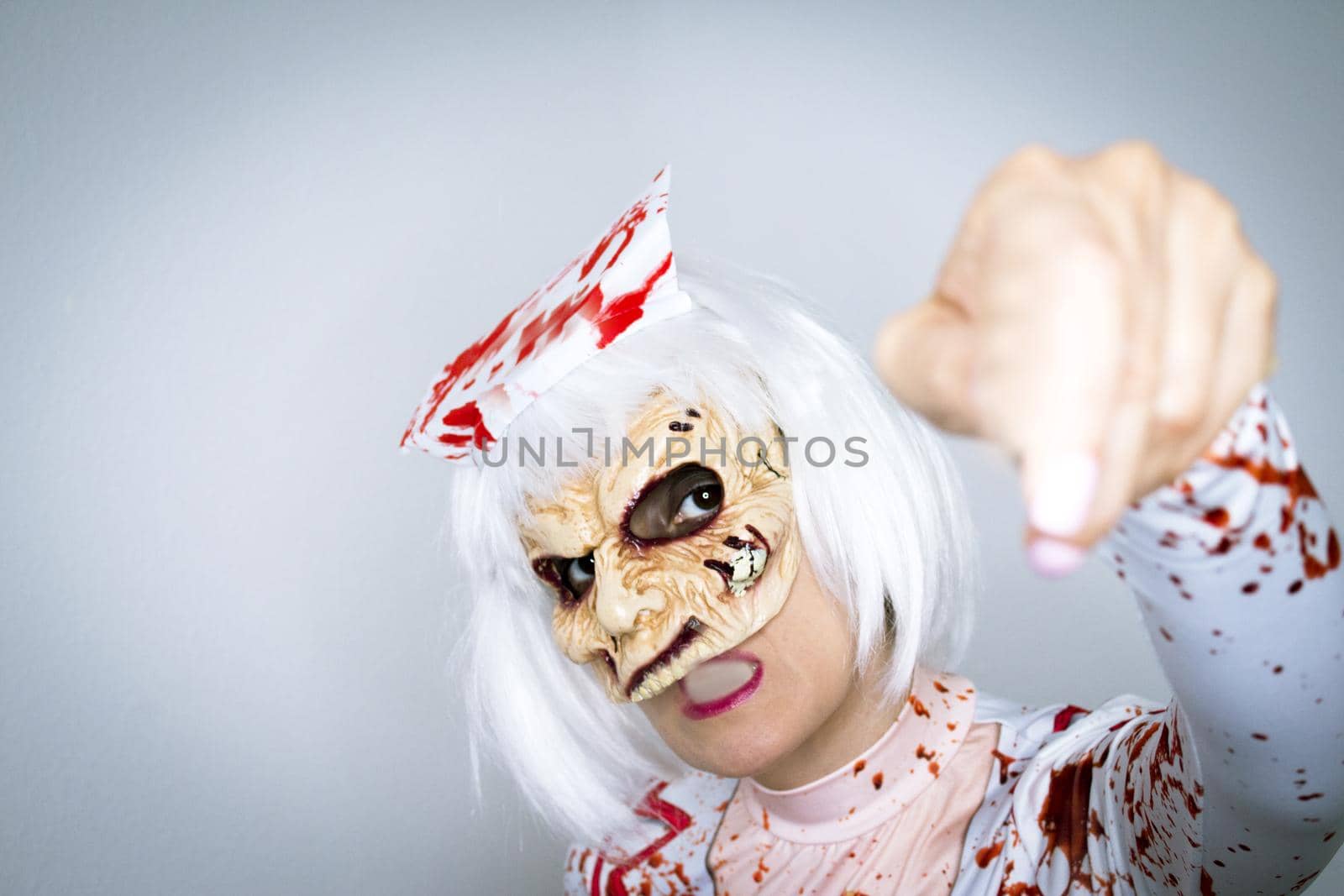 Woman dressed as a killer nurse for Halloween night
