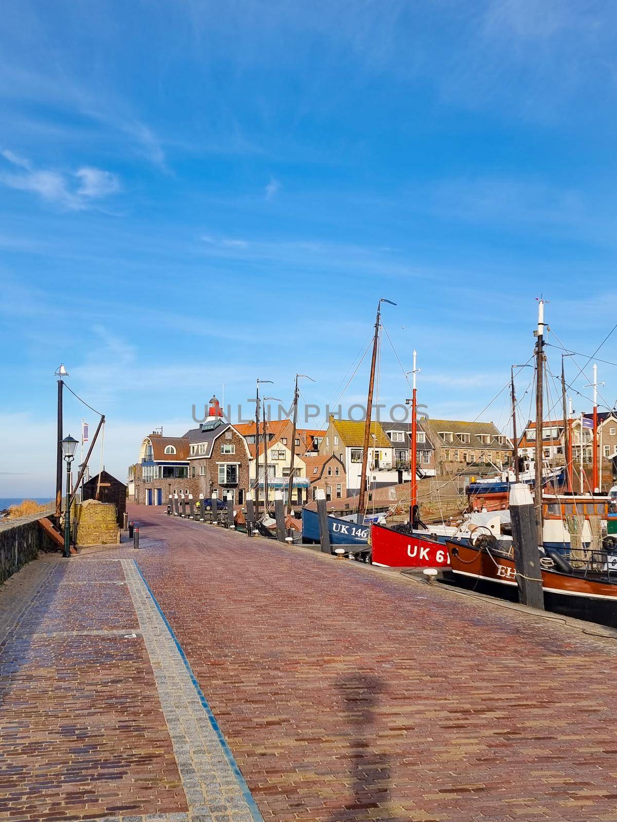 old harbor of the fishing village Urk in Flevoland Netherlands, beautiful Spring day at the former Island of Urk Holland Europe February 2021
