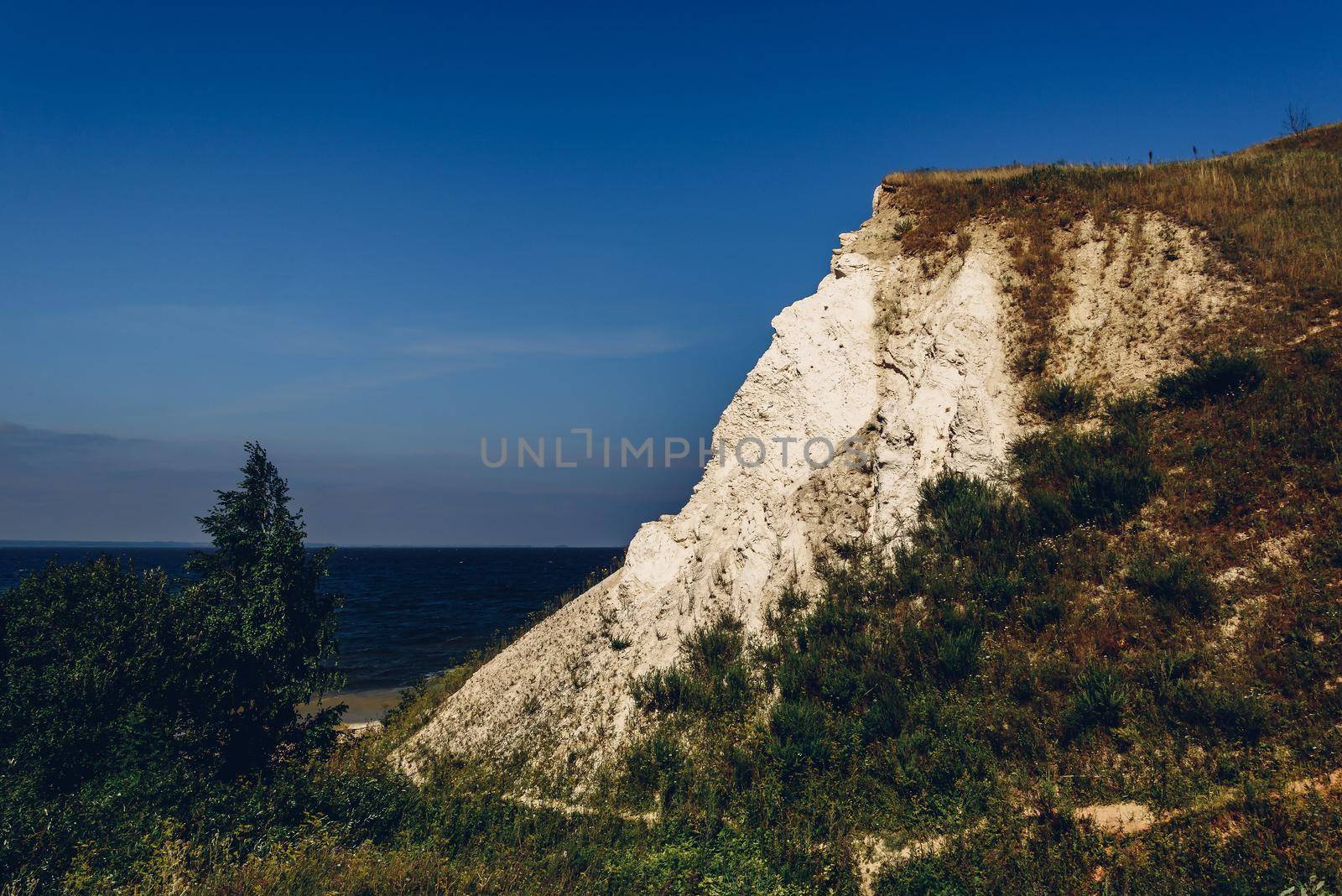 Landscape of a dolomite cliff next to the river