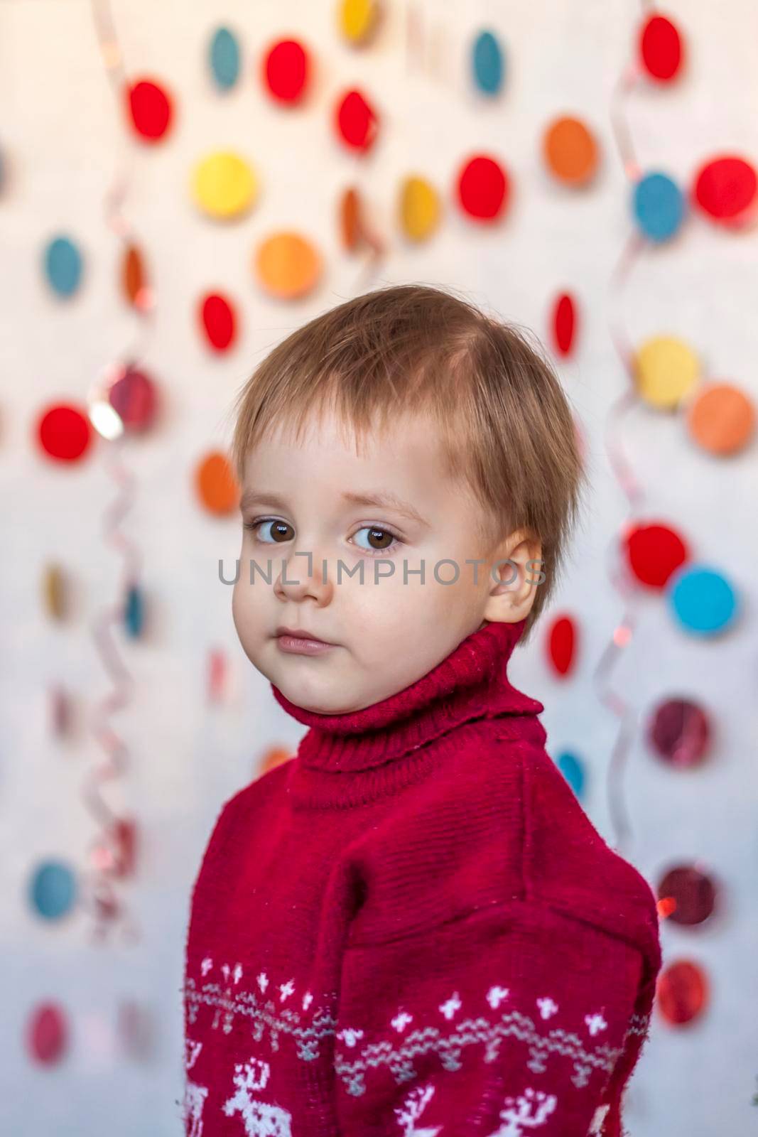 Portrait of a cute boy. Children's emotions. Christmas and new year. The concept of an advertising banner.