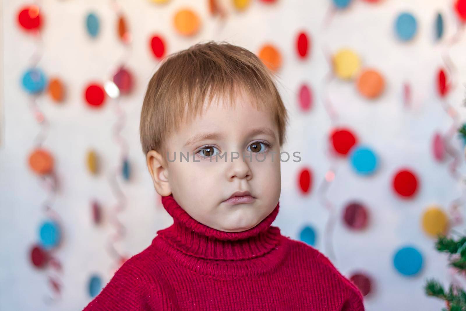 Portrait of a cute boy. Children's emotions. Christmas and new year. The concept of an advertising banner. 