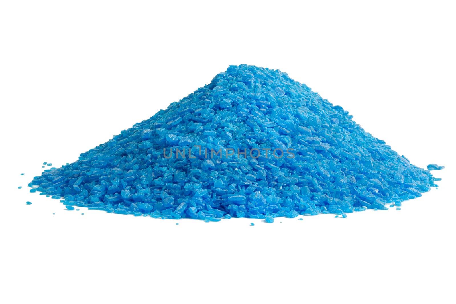 Pile of blue copper sulfate granules - close-up isolated on white background. Edge-to edge sharp.