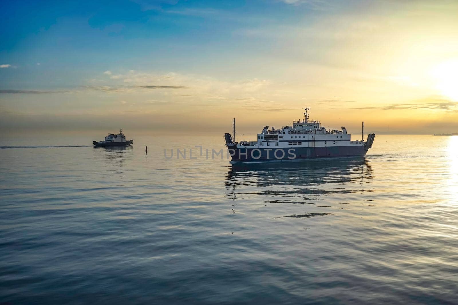 Kerch Strait at sunset, view of the sea and ships.