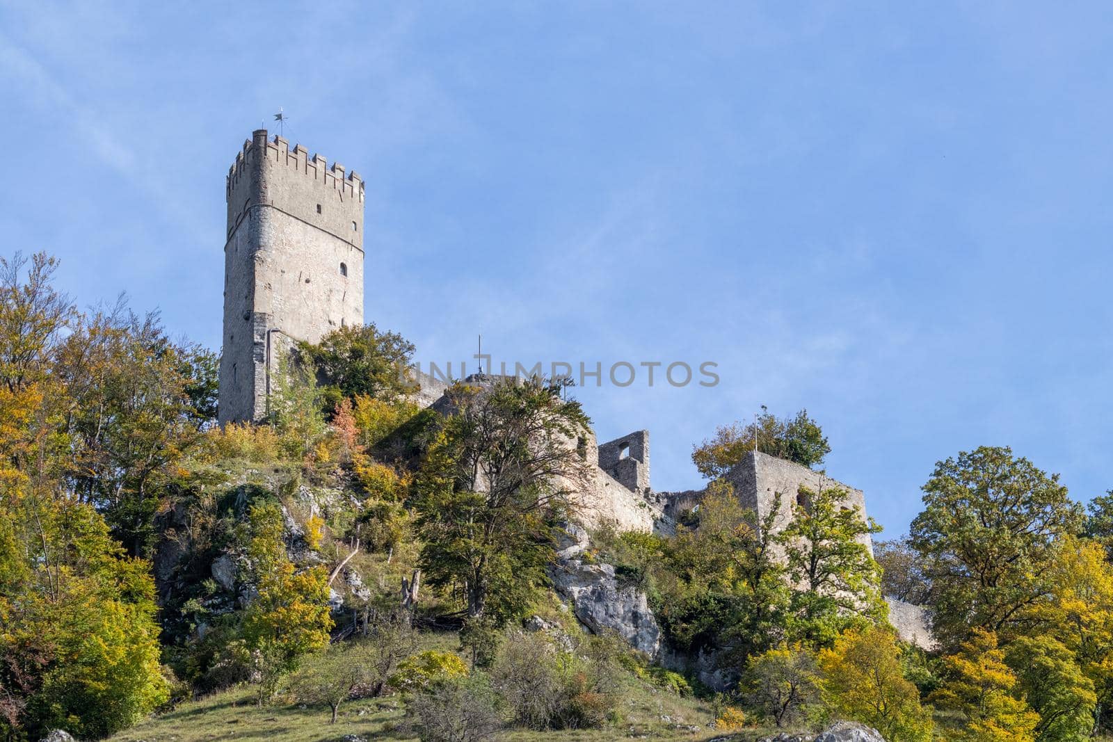 Idyllic view at Randeck castle in Markt Essing in Bavaria, Germany in autunm with multi colored trees