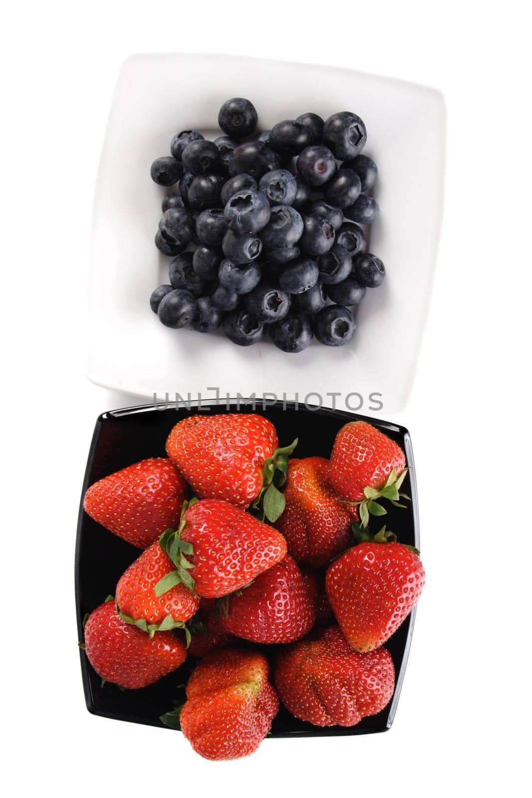 Blueberries and strawberries by moodboard