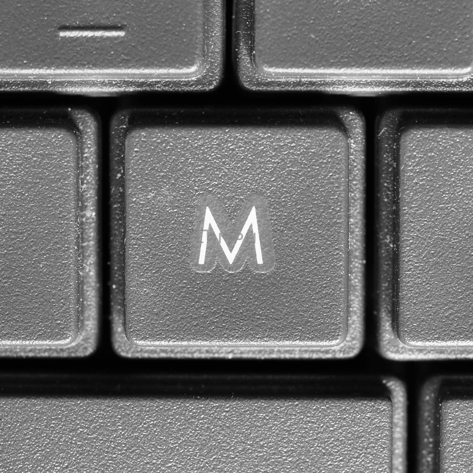 Letter M key on computer keyboard keypad