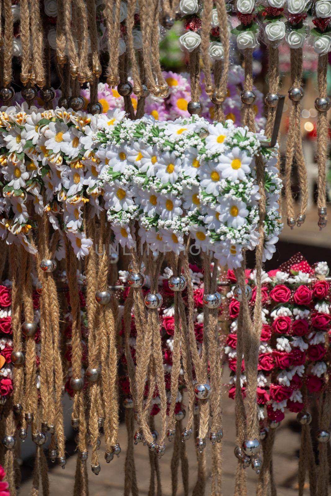 Head crown made of beautiful fake flowers wreath