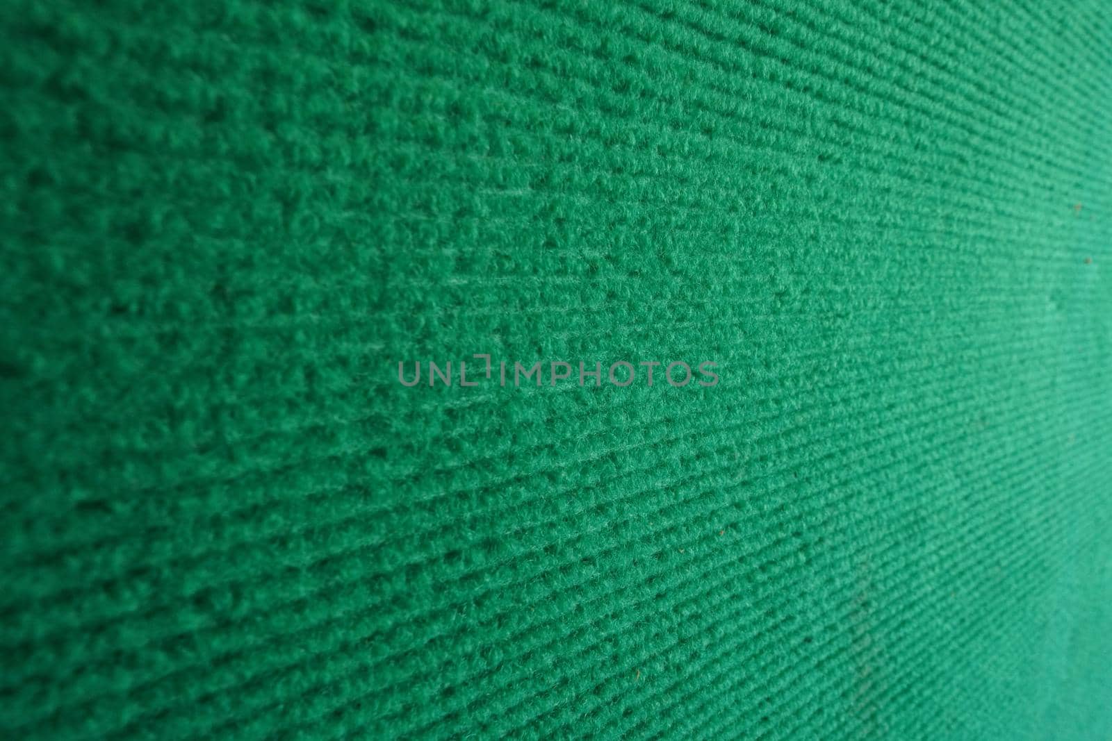 Velvet fabric wall with green background selective focus. by noppha80