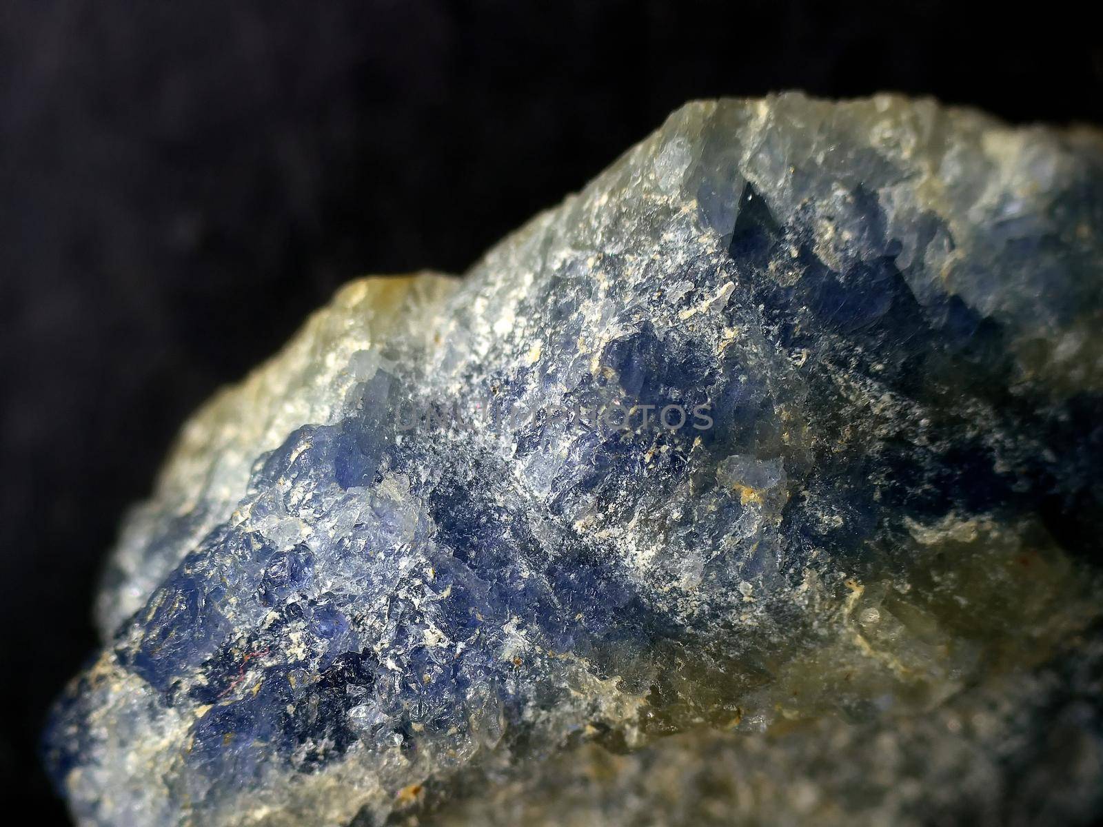 blue sapphire in a macro shot by Jochen