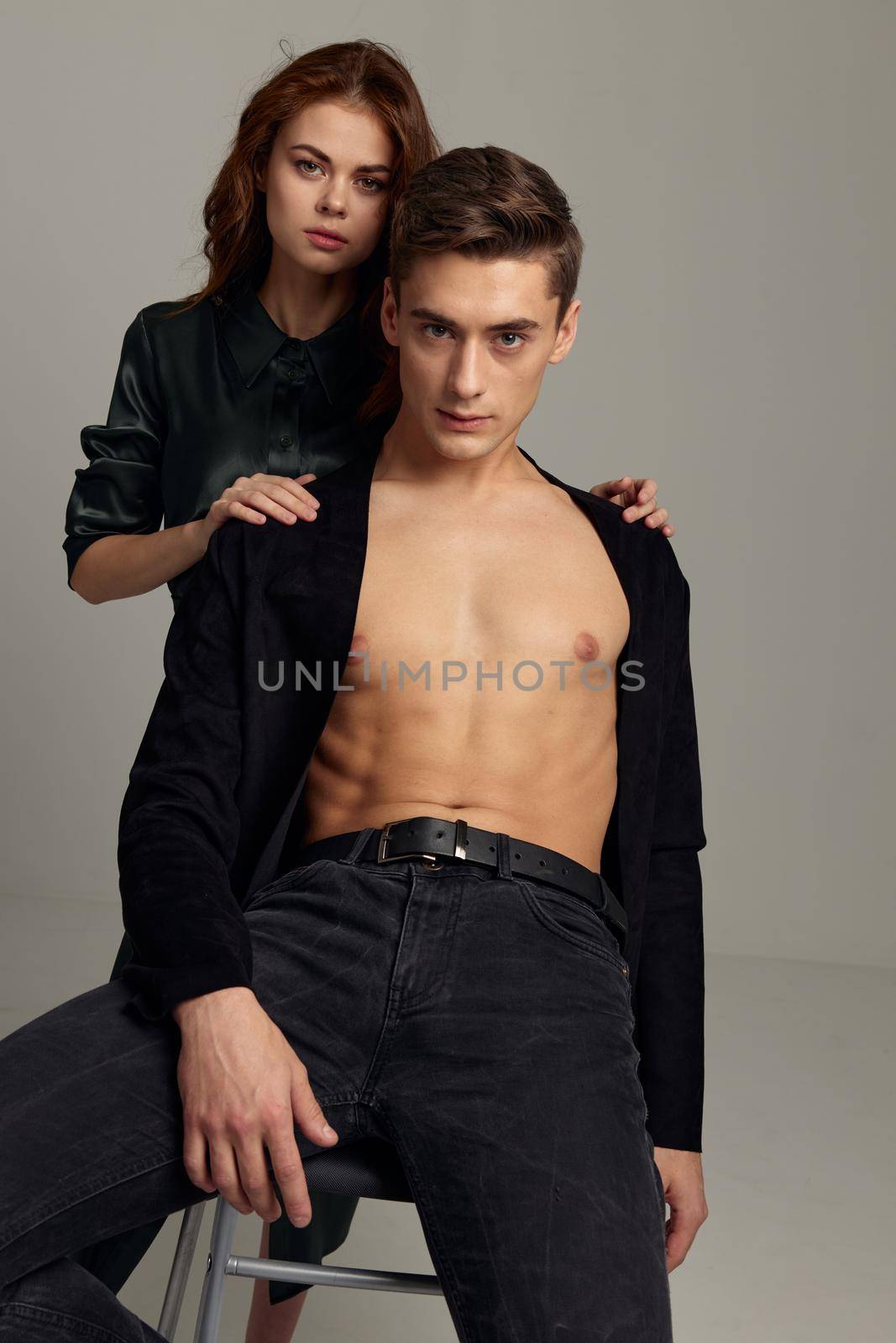 Pretty man near woman sitting on chair sexy style attractiveness Friendship relationship by SHOTPRIME