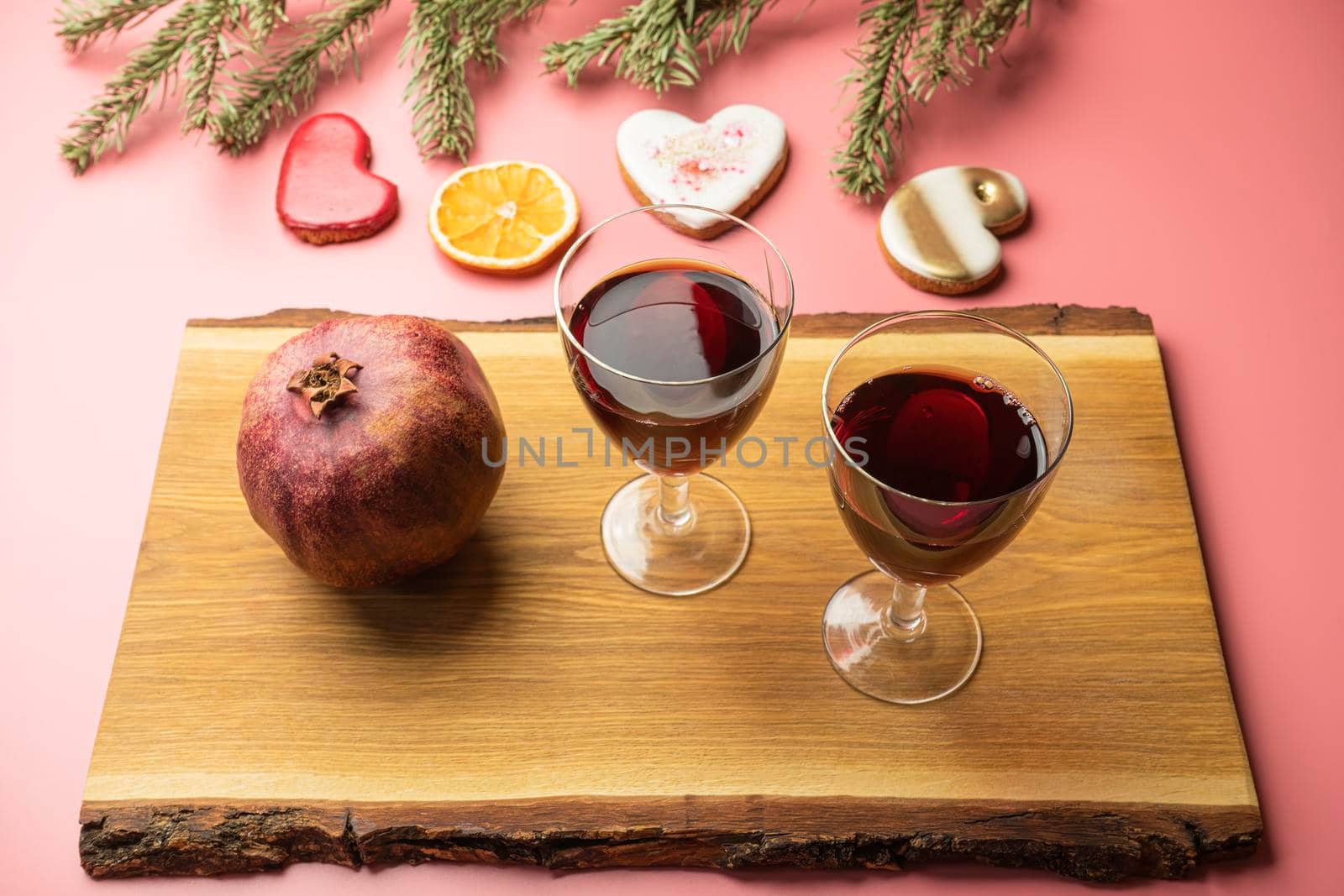 ripe pomegranate on a pink background. love. Fruit. High quality photo