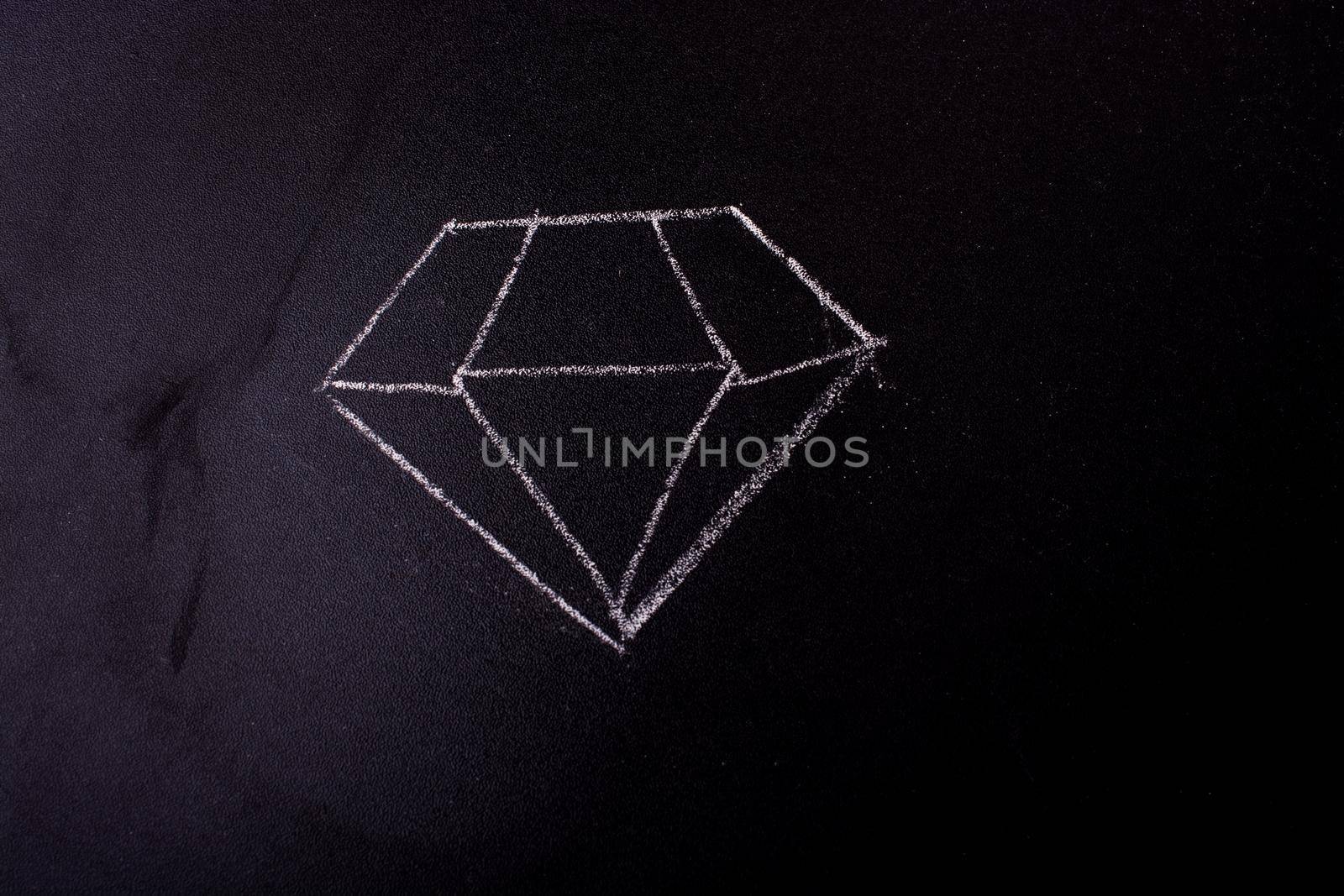 Chalk drawn diamond on a blackboard on display by berkay