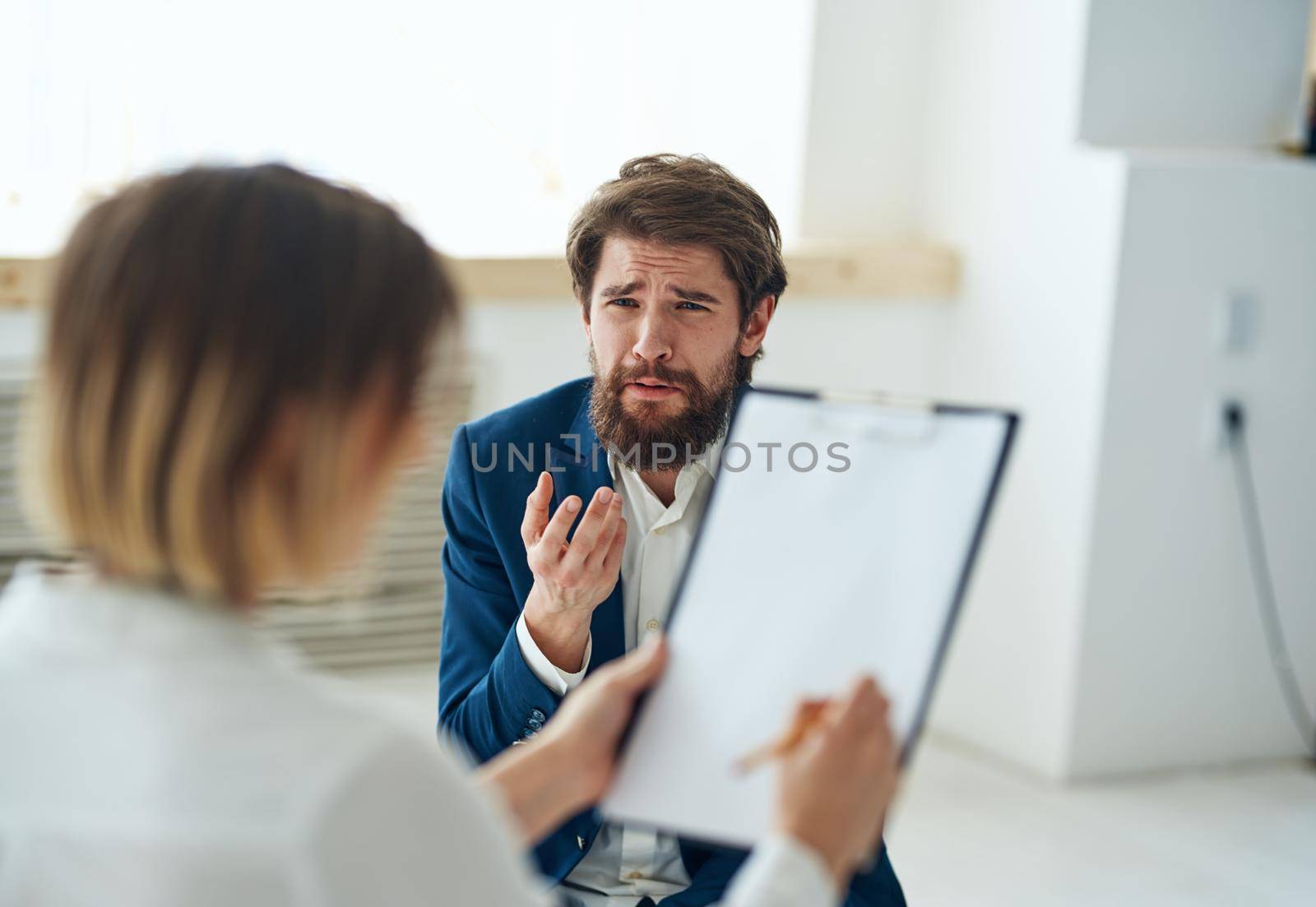 A man at a psychologist's consultation, diagnosis of communication problems. High quality photo