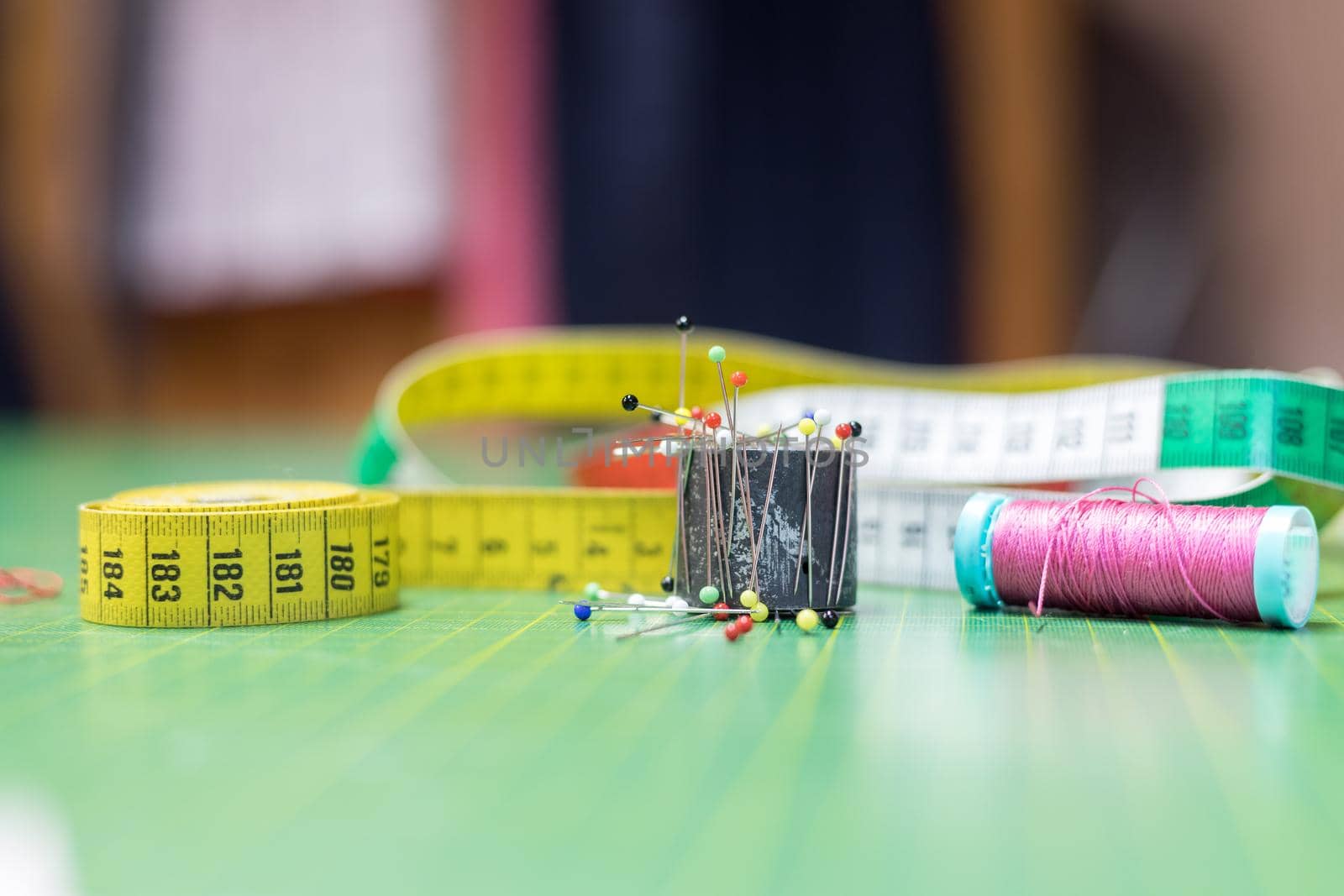 Close up of measuring tape in a textile workshop