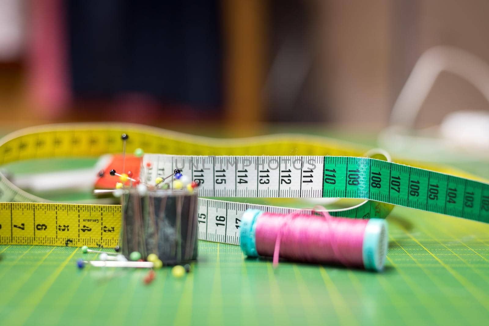 Close up of measuring tape in a textile workshop