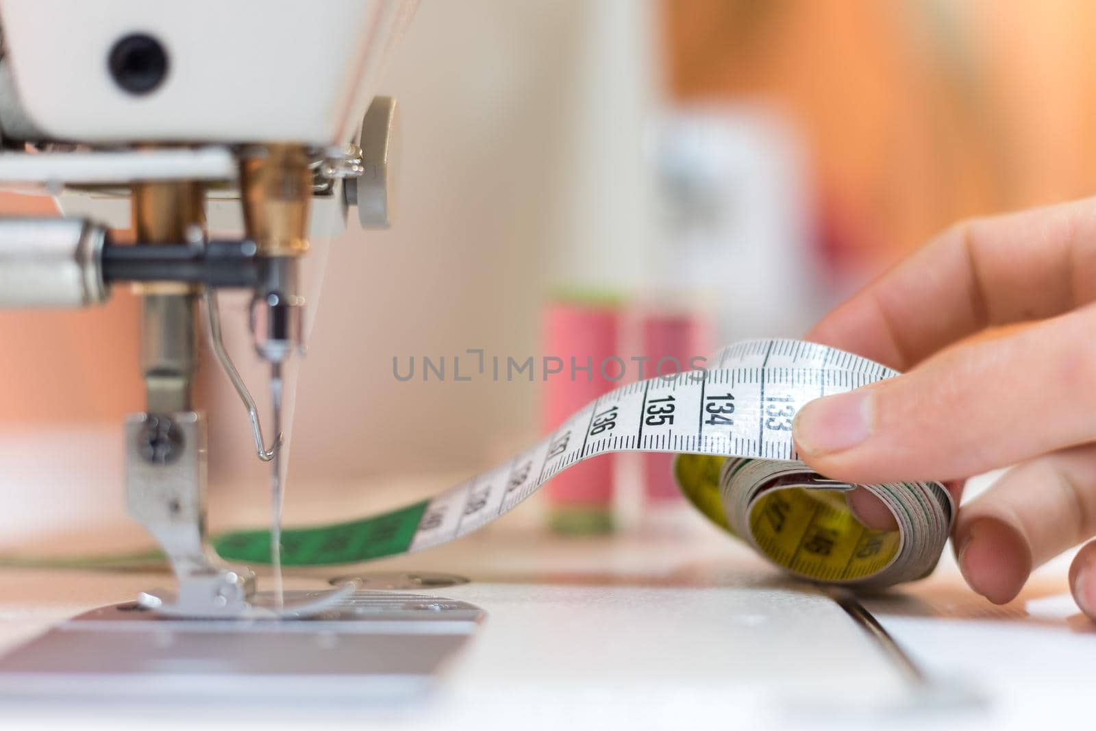 Close up of measuring tape in a textile workshop