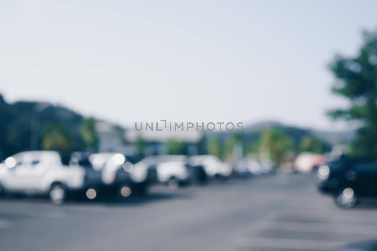 Blur car park with many cars abstract background. Vintage tone color.