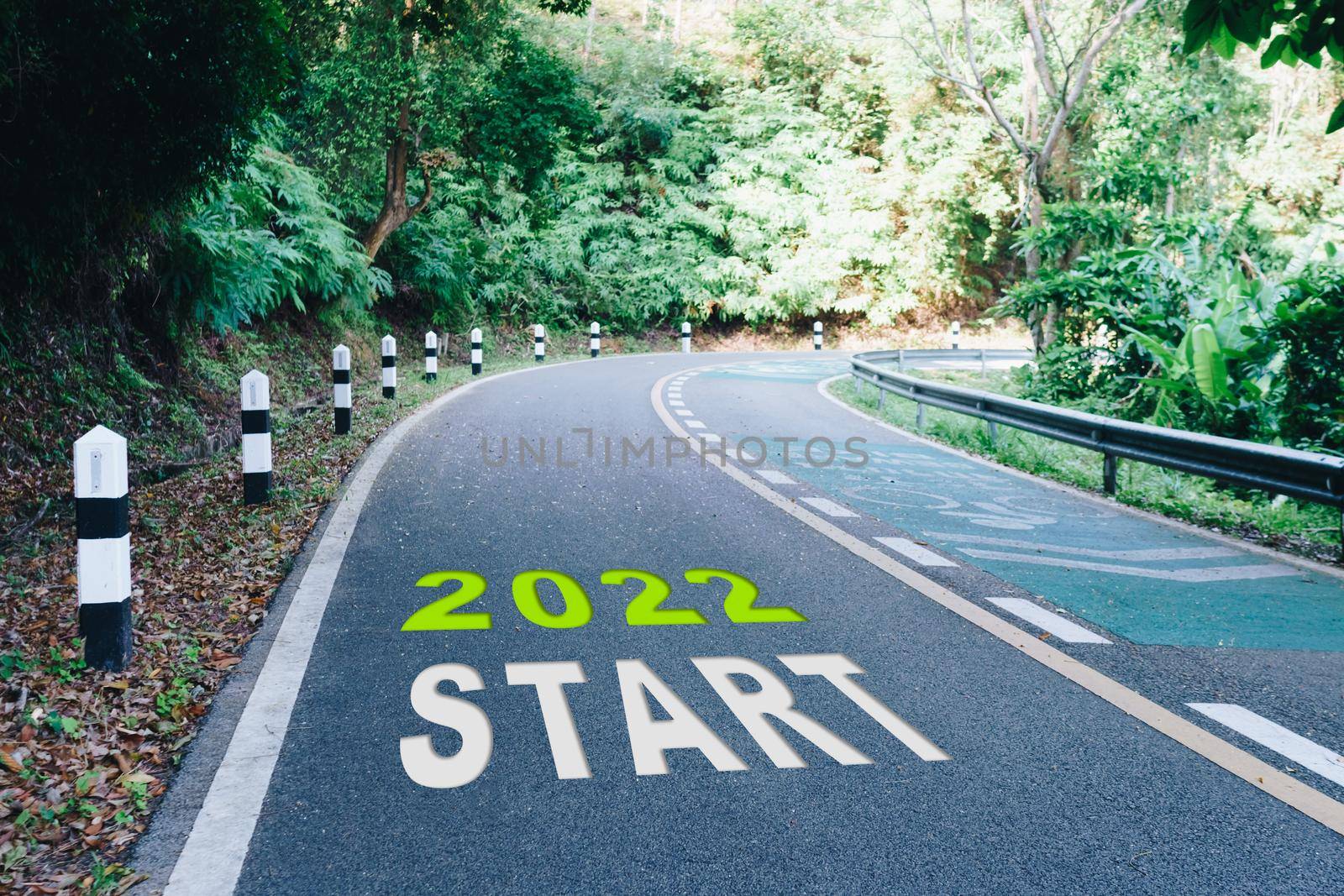 Start line to 2022 on road in wood the beginning of a journey to the destination in business planning, strategy and challenge or career path, opportunity. by Suwant