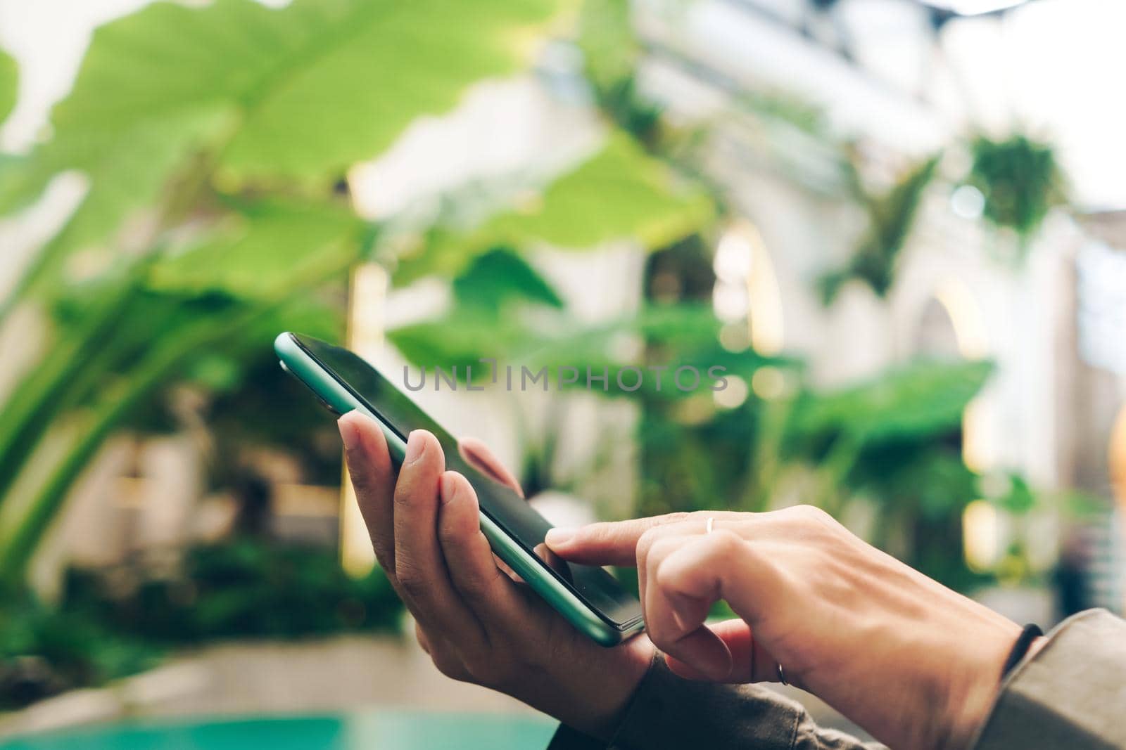 Woman hand using smartphone to do work business, social network, communication concept.