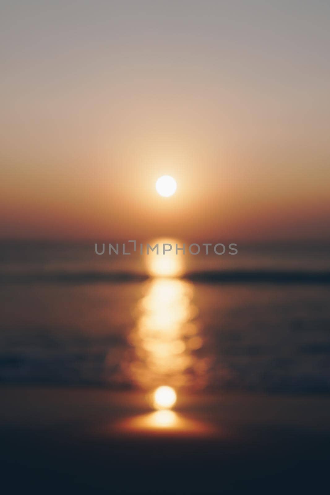 Blur tropical nature clean beach sunset sky time with sun light smartphone wallpaper background.