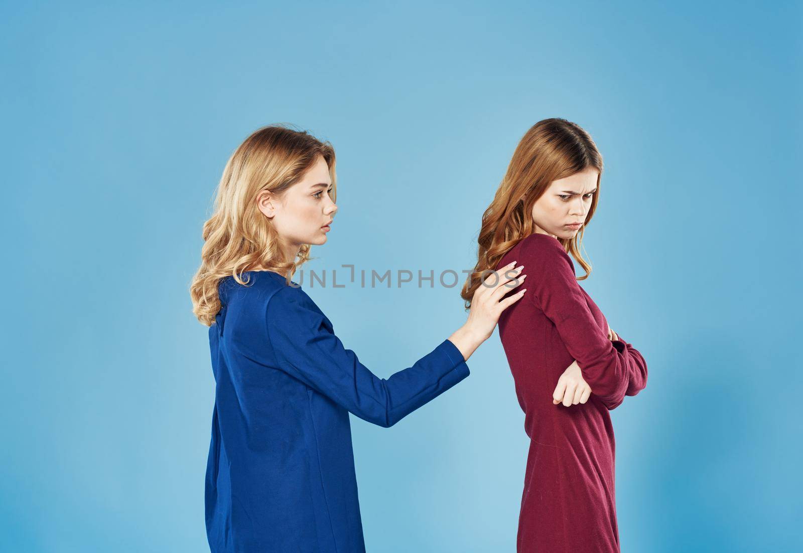 Two pretty women elegant communication style lifestyle conflict discontent quarrel by SHOTPRIME