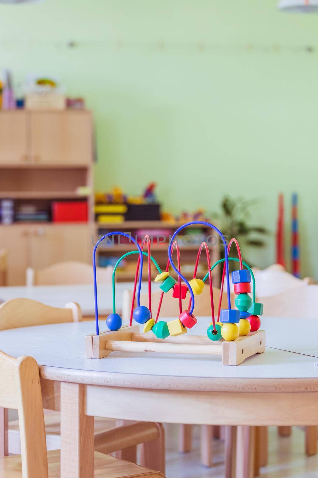 Close up of colorful wooden toy for learning and socialization