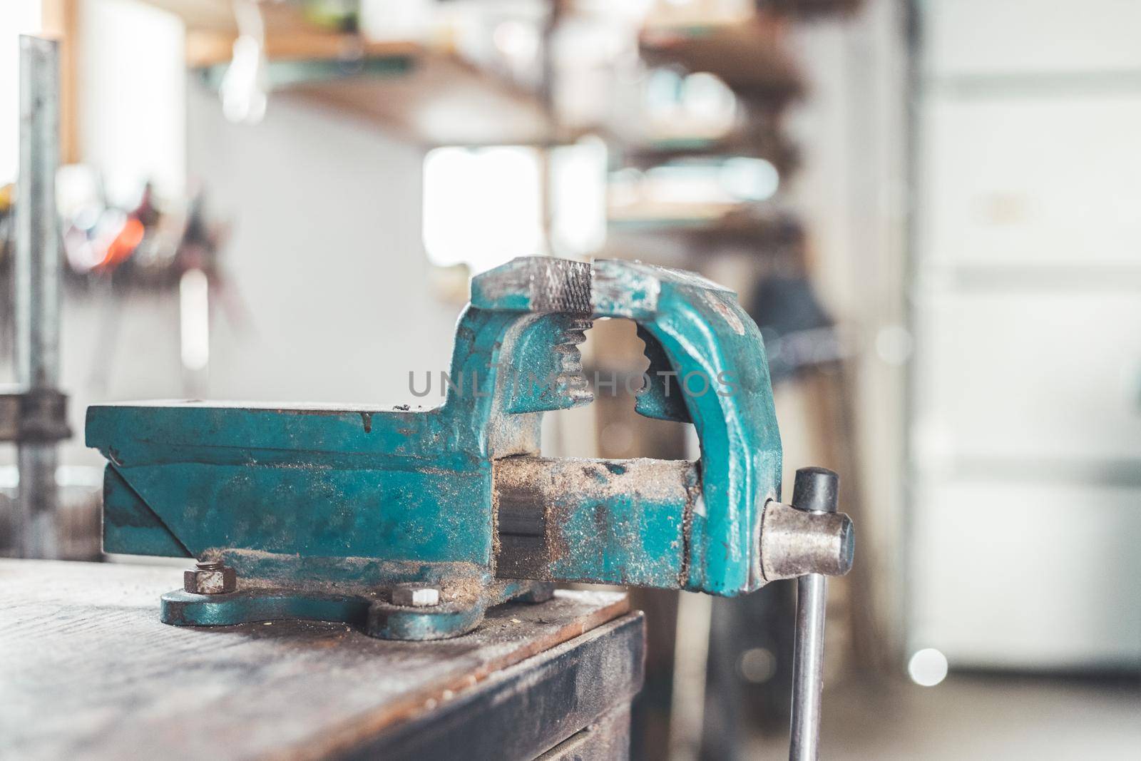 Close up of a metal vice in a garage workshop