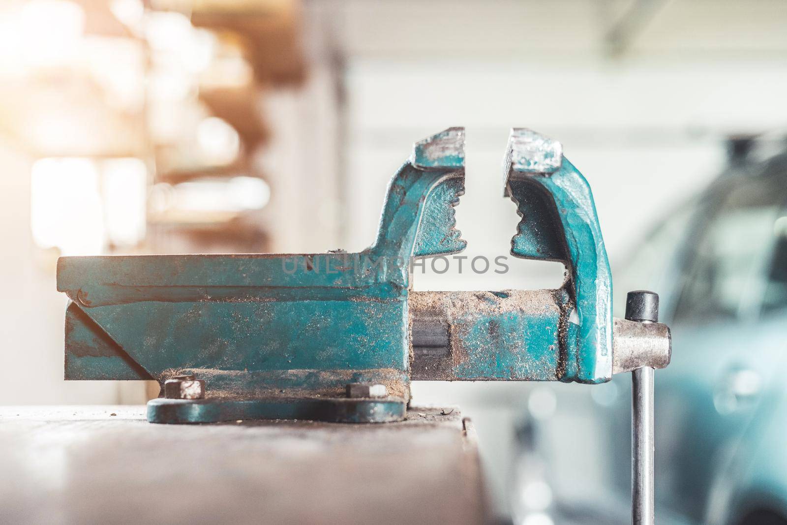 Close up of a metal vice in a garage workshop