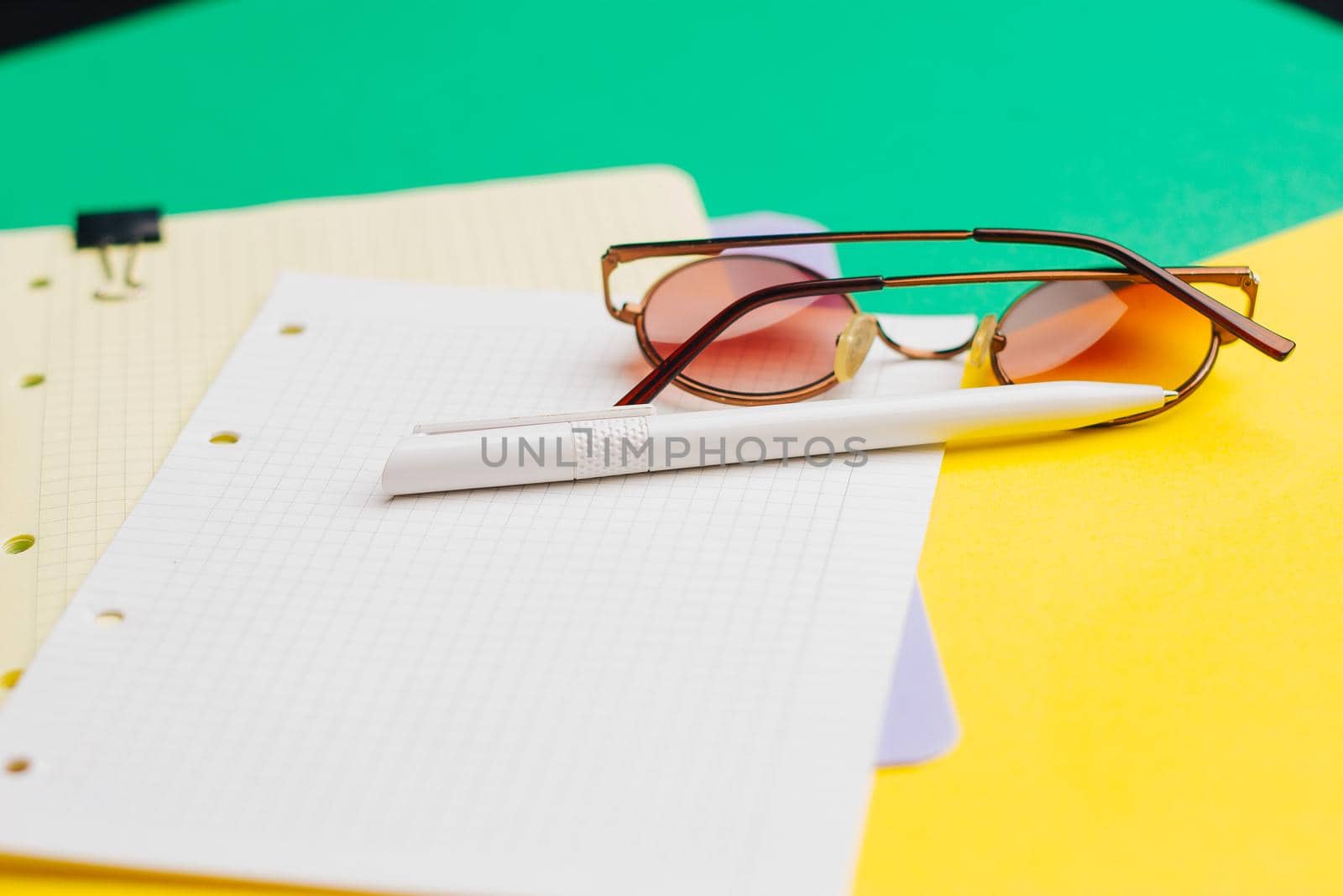 office glasses notepad paper pen the office work. High quality photo