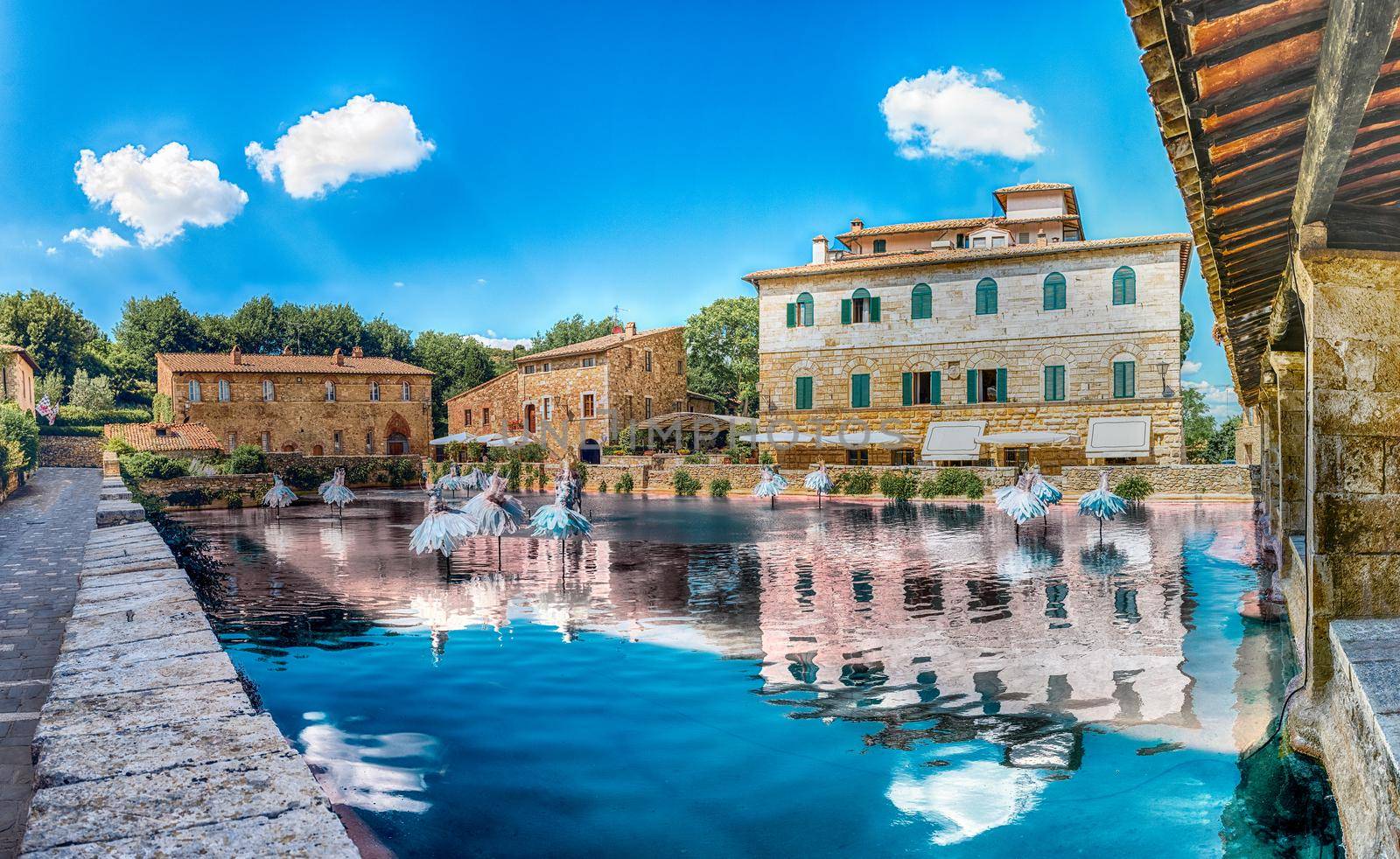The iconic medieval thermal baths, major landmark and sightseeing in the town of Bagno Vignoni, province of Siena, Tuscany, Italy