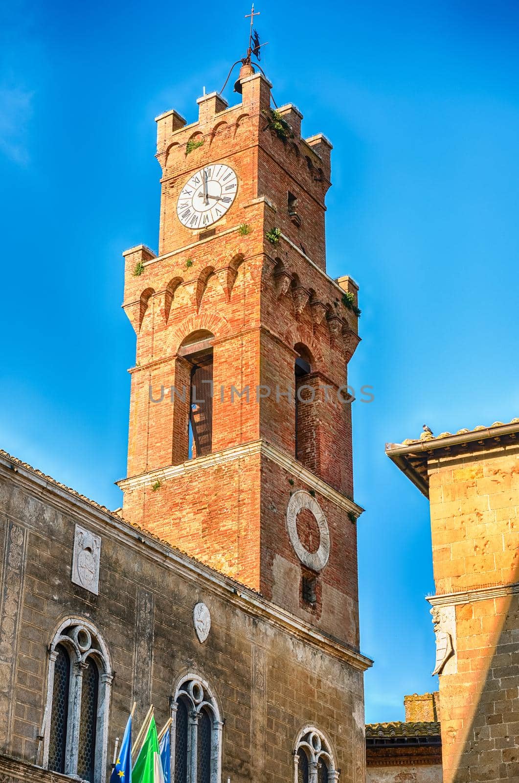 Clocktower of the Town Hall of Pienza, Tuscany, Italy. It is located in Piazza Pio II, the pope whose name was given to the city: Pienza means in fact "City of Pius"