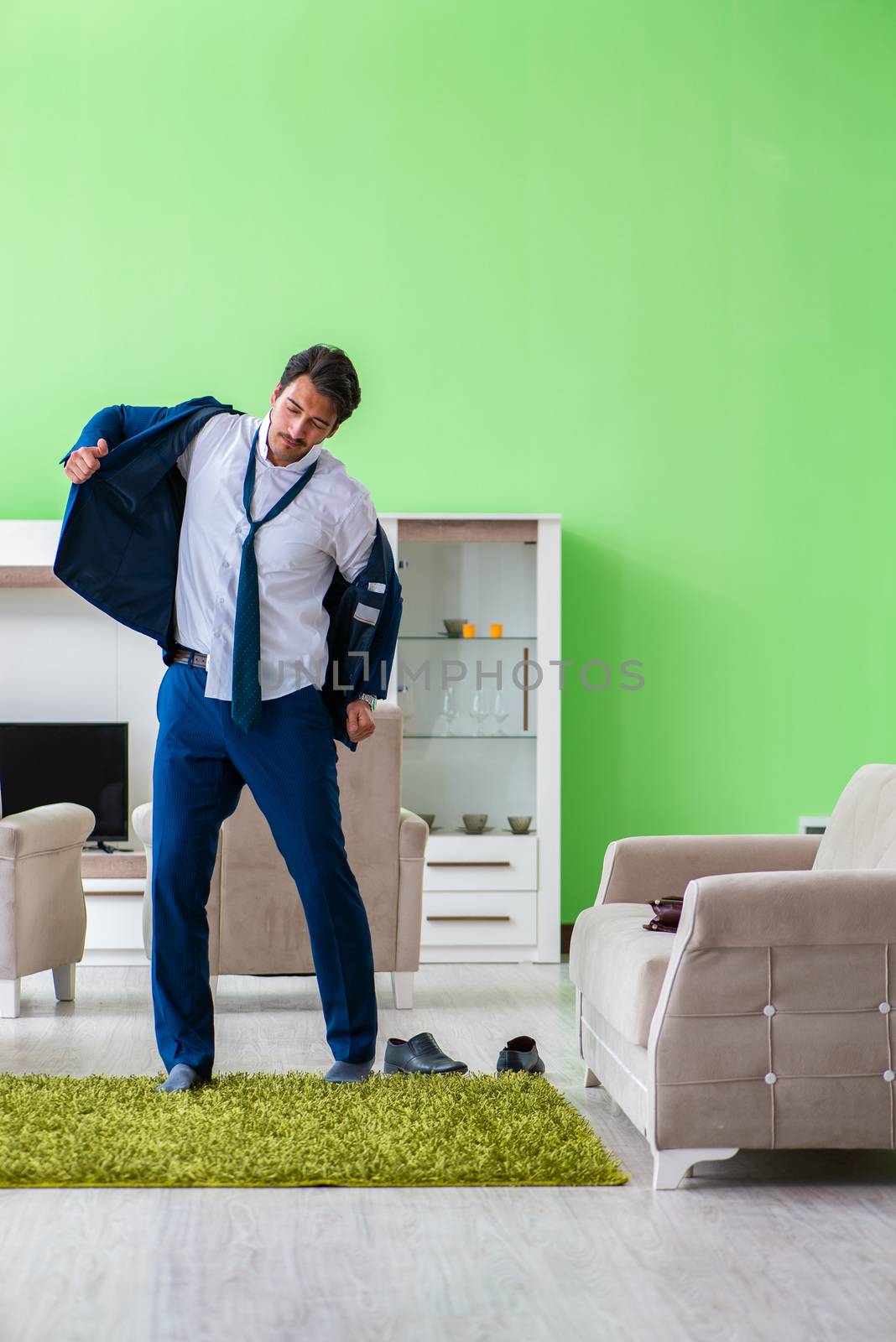 Man dressing up and late for work
